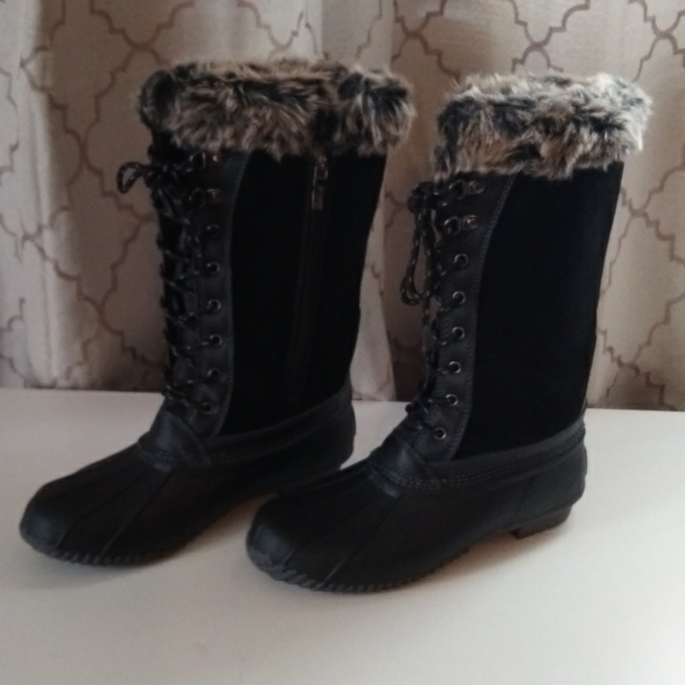 Sporto duck boots.  Gentle used.